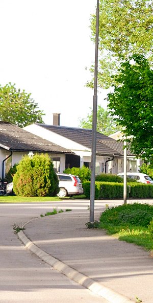 Street and homes in a typical suburban neighbourhood